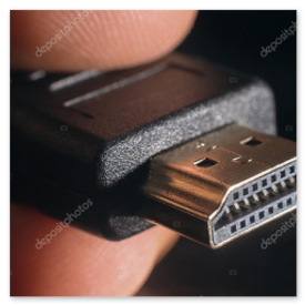 HDMI cable and small adapters on a desk