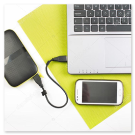 External hard drive and USB flash drives on a table