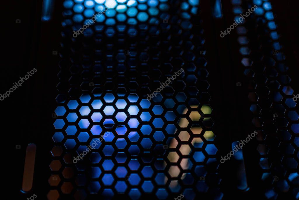 Custom gaming PC with illuminated components on a desk
