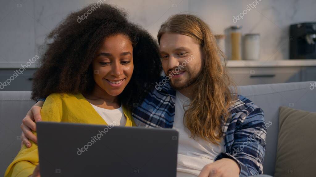Budget laptop on a kitchen table being used for web browsing